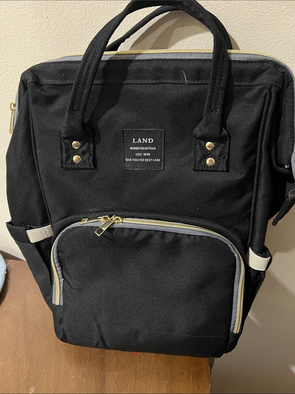 AND Black babies diaper bag Backpack with Gold Accents